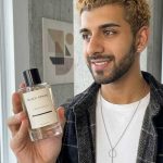 Black Stripe male customer with black stripe bottle